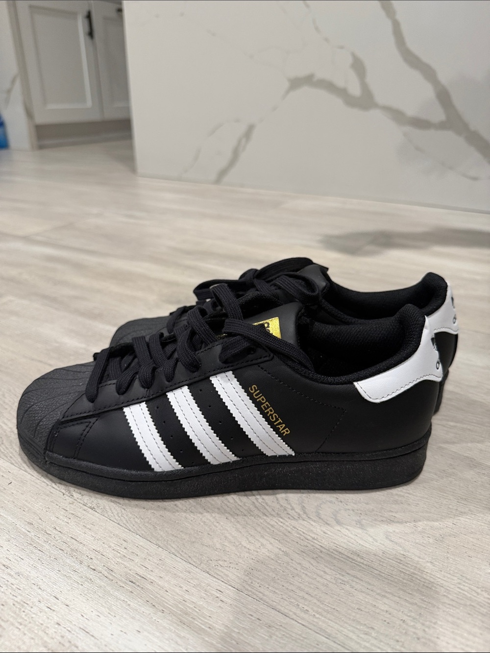 adidas Superstar Sneakers - Black/White with Gold Accent